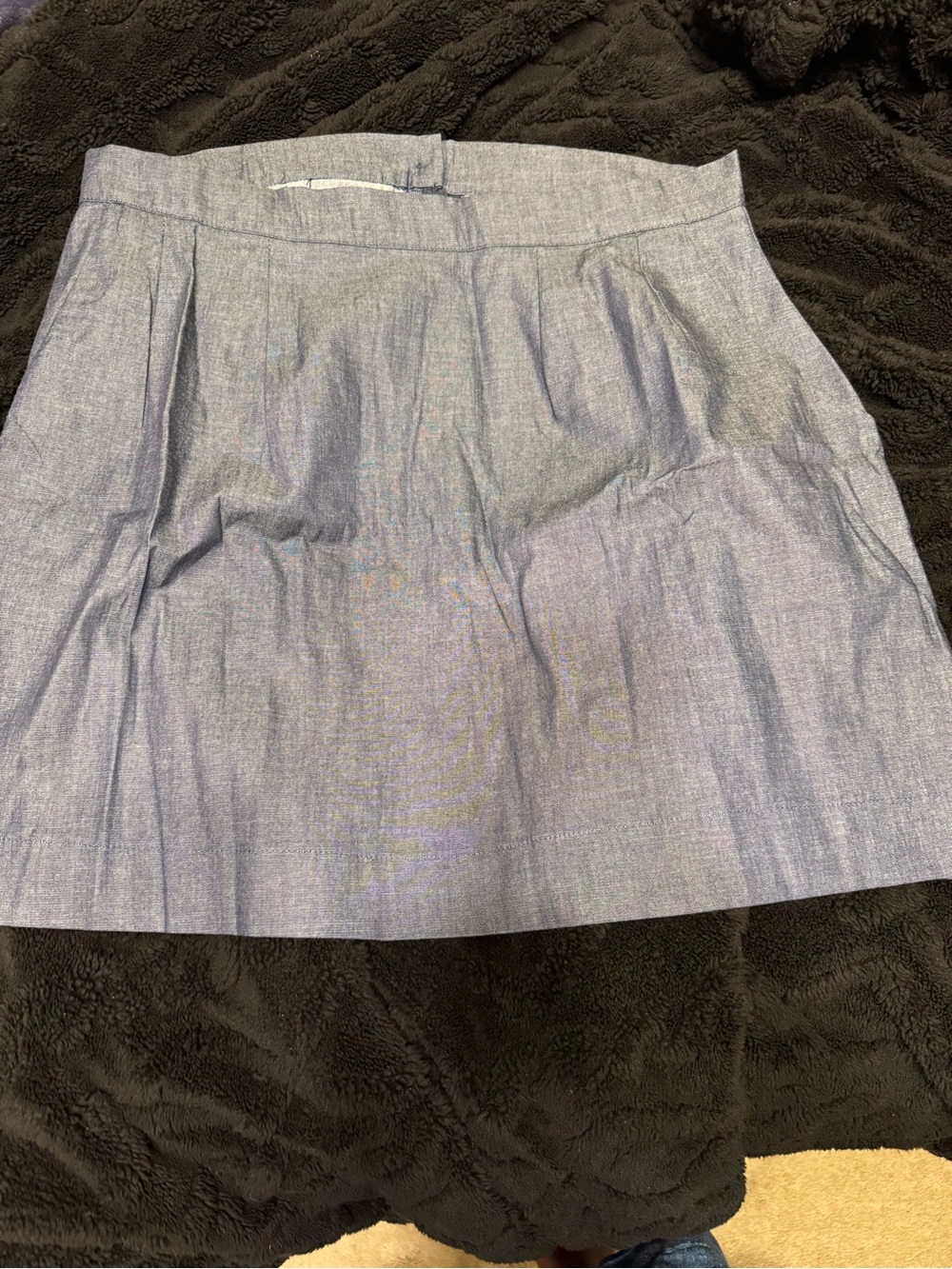 Medium wash NWT chambray mini skirt with pockets! Size XL